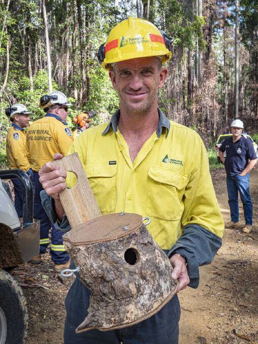 Forestry Corporation field ecologist Peter Simon with one of the nesting boxes.