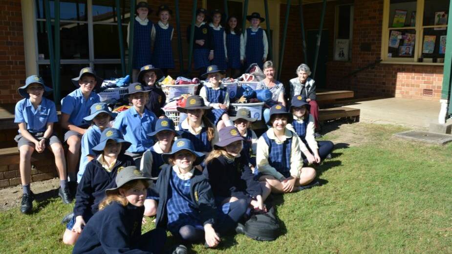 St Josephs Primary students at Wauchope with their mini Vinnies donations.