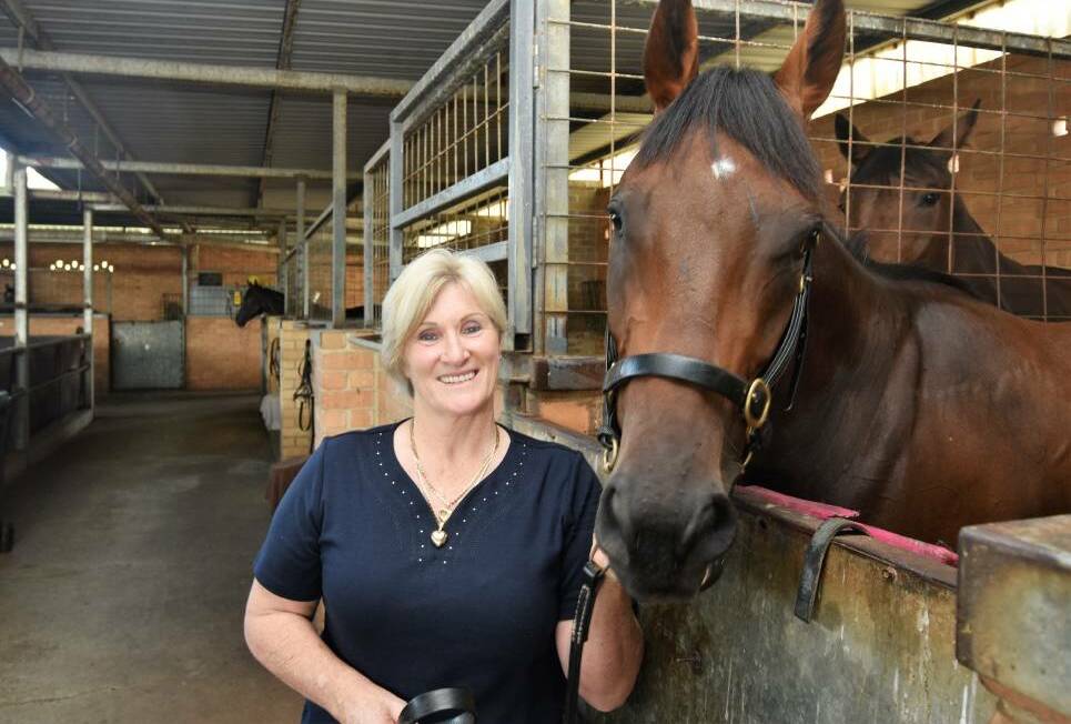 Port Macquarie's Jenny Graham with Victoreum. The Mid North Coast's five-year-old gelding was guaranteed a start in the $350,000 The Stradbroke on June 6 at Eagle Farm with a sensational win at that track on Saturday in a $175,000 race over 1200m.