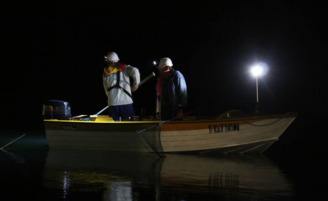Night time: Two people fishing at night: Photo: Supplied/Roads and Maritime Services