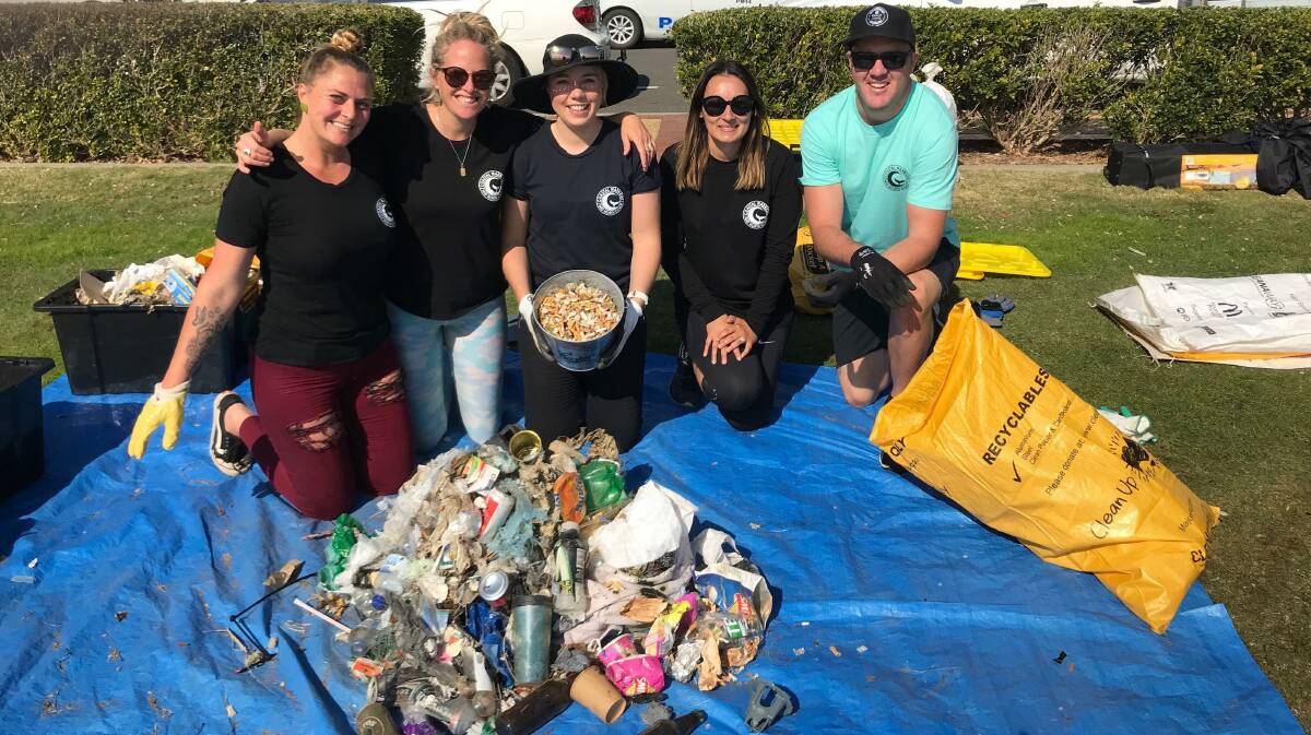 Cleaning house: Committee members from Coastal Warriors Mid North Coast with collected plastics and rubbish from a previous event.