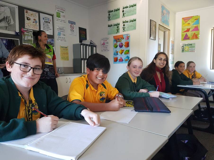 School students exploring the written and digital word in 2019.
