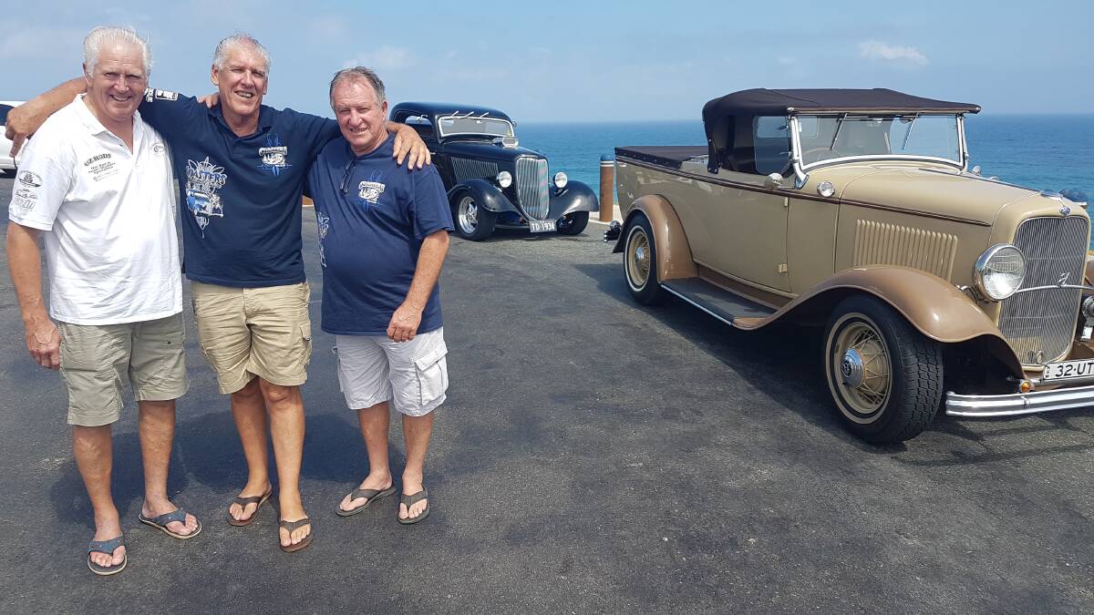 Set to shine: Tom Dennerley, Brad Hammon and Bill Reid with a 1932 Ford Ute and 1934 three window Ford Coupe. 
