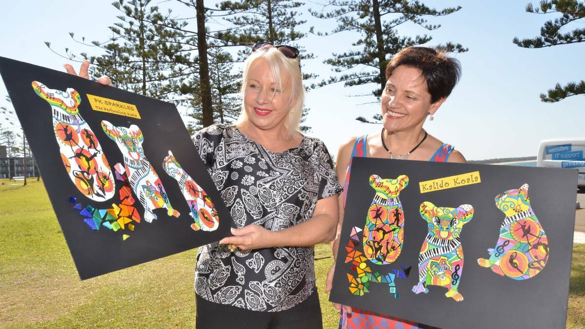 KOALA ART: Artist Francesca ODonnell, at right, shares her mosaic design submissions with Hello Koalas project manager Linda Hall (left).