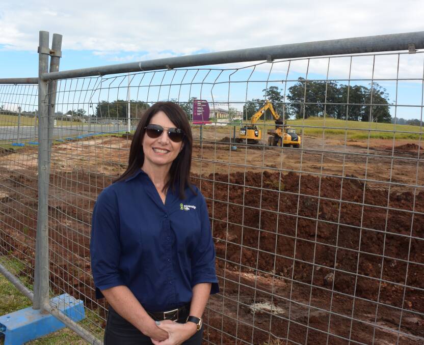 Milestone: Sovereign Hills office manager/sales assistant Nicole Landy looks over the progress of the Sovereign Hills town centre earthworks.