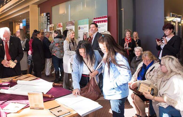 Community members support the Welcome Scroll Project at Port Adelaide in South Australia.