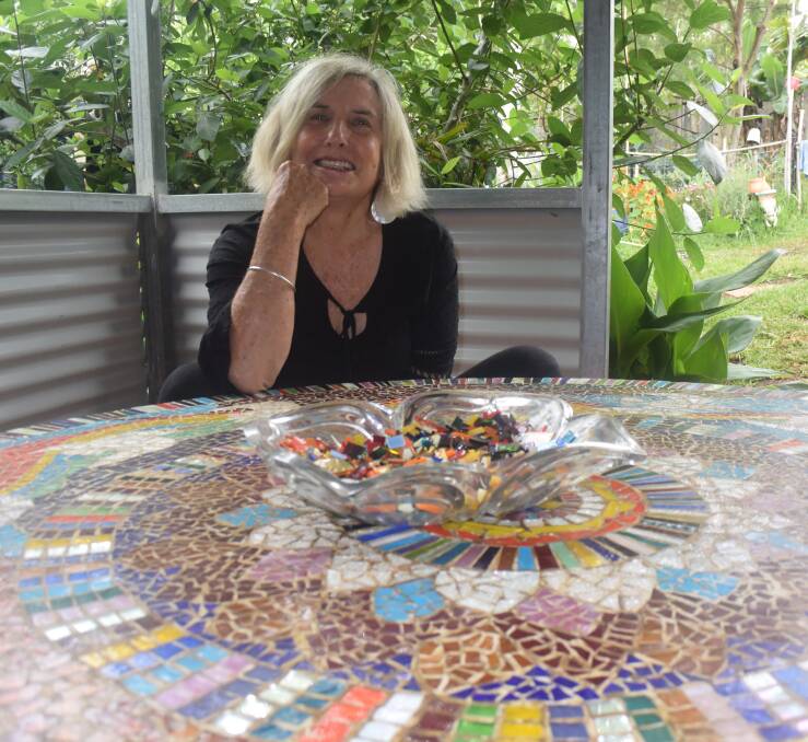Rewarding approach: Artist Krissa Wilkinson uses glass scraps and found objects in her mosaic works.