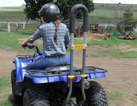 A quad bike fitted with a roll bar.