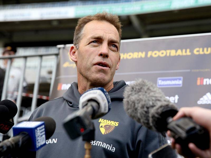 Hawks coach Alastair Clarkson looms large over the AFL grand final despite his team not being there.