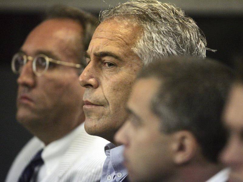Two prison guards are charged with falsifying records after they failed to check on Jeffrey Epstein.