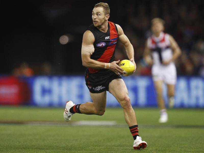 Essendon forward Devon Smith has been sidelined by a a knee injury which requires surgery.
