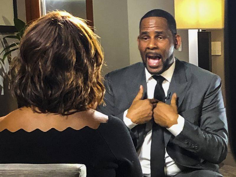 R. Kelly, who is facing jail for not paying child support, was in tears during the interview.