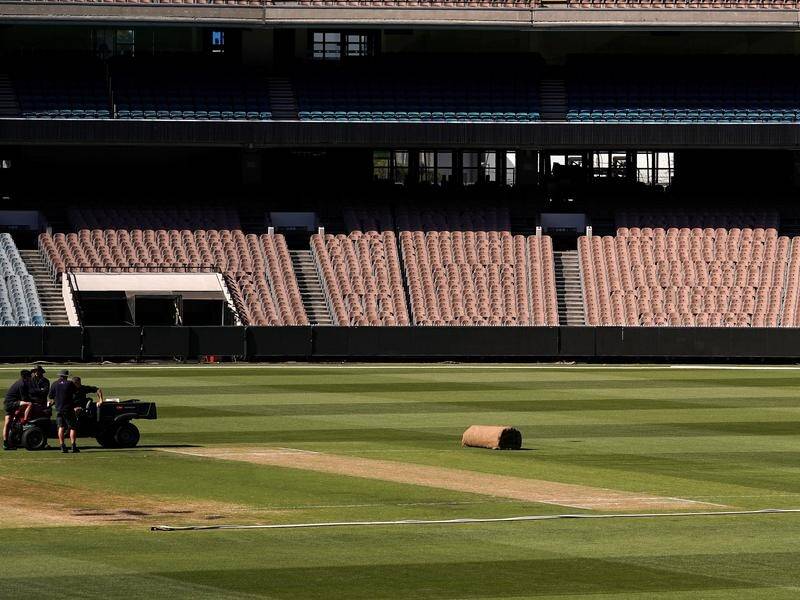 Ground officials are working hard to get the MCG pitch up to scratch for the Boxing Day Test.