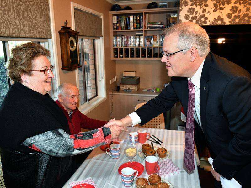 Scott Morrison visited Ray and Wendy White, who receive residential care at their Canberra home.