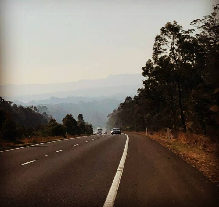 Motorists are advised to take caution when driving on the Pacific Highway die to smoke from a hazard reduction burn. Photo: NSW Rural Fire Service Mid Coast District. 