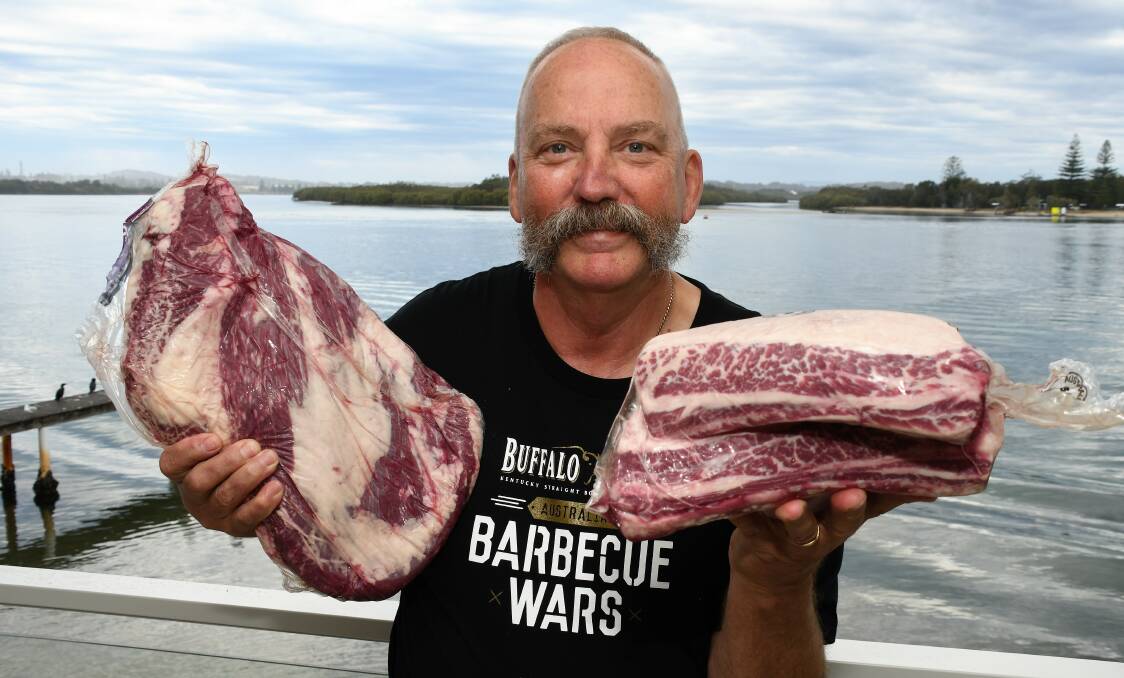 Meaty goodness: Garry Waddell, butcher and barbecue competitor, with a whole beef brisket and beef ribs. Photo: Matt Attard